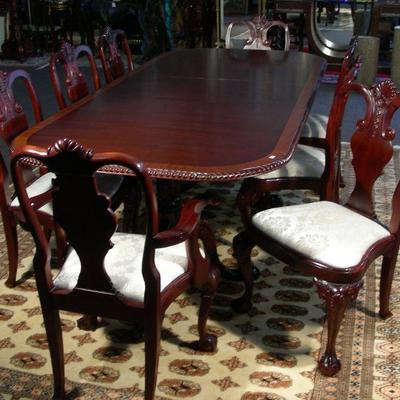 Hand carved mahogany dining table with 8 chairs