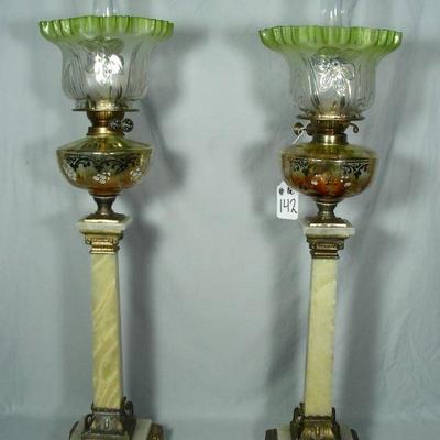 Pair of tall antique onyx oil lamps