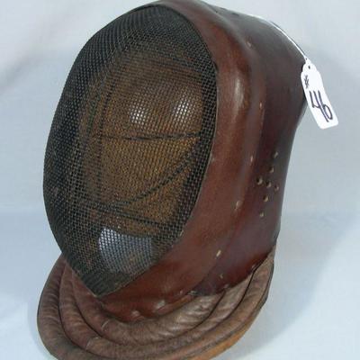 Vintage fencing mask on stand