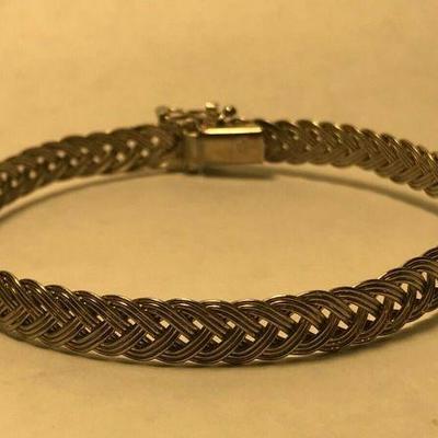 WL108 STERLING SILVER BRAIDED WOVEN BRACELET	https://www.ebay.com/itm/124320686788	BIN	 $20.00 
