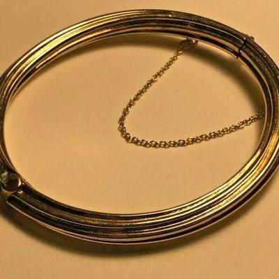 WL114 STERLING SILVER GOLD TONE BRACELET WITH CHAINED CLASP	https://www.ebay.com/itm/124320686785	BIN	 $20.00 
