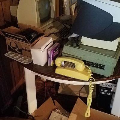 Apple computer, telephone, lots of vintage office
