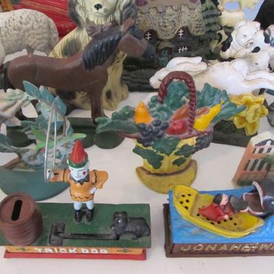 A large collection of door stops & coin banks in all themes.
