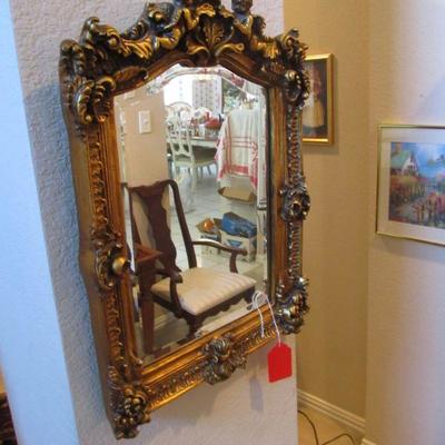 Pretty gold mirror