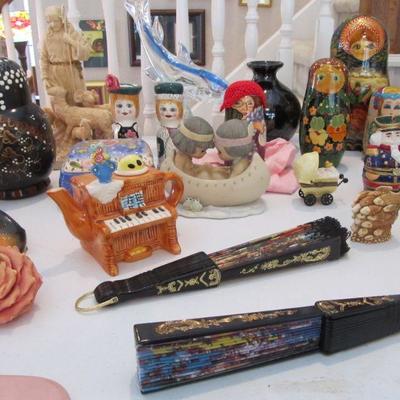 Lot's of fun small decor items including REAL Russian nesting dolls, Swavorski gold, and enamel trinket holders, Repo toys from the...