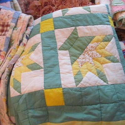Antique handmade one-of-a-kind quilts!