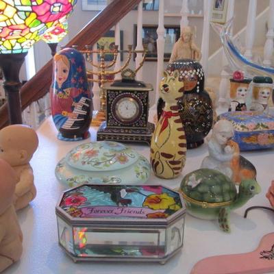 Lot's of fun small decor items including REAL Russian nesting dolls, Swavorski gold, and enamel trinket holders, Repo toys from the...