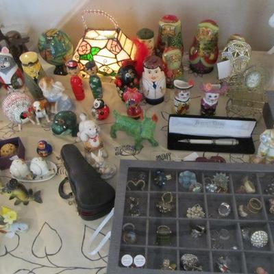 Lot's of fun small decor items including REAL Russian nesting dolls, Swavorski gold, and enamel trinket holders, Repo toys from the...