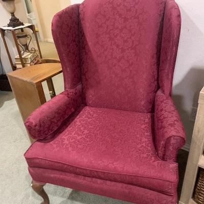 Red damask wing-back chair