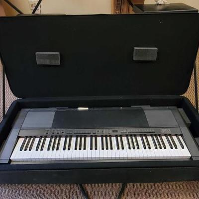 1068	
Korg Digital Piano with Korg Piano Module and Case
Model DP-2000C