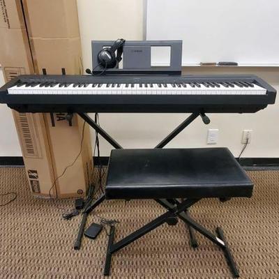 1062	
Yamaha Digital Piano with Stand, Seat, Box and Head Set
Includes Stand, Seat, Box and Headset Model P-45