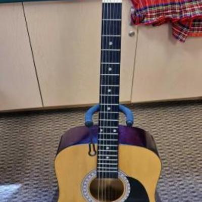 1042	
Burswood Acoustic Guitar with Soft Case
Measures approx 41