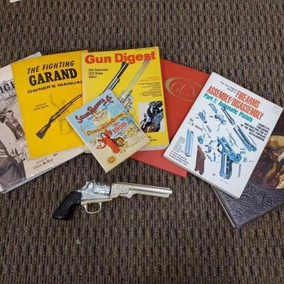 1100	
The Gunfighters Book, Sears Robuck snd Co. Consumers Guide Booklet, Gun Digest Book, The Fighting Grand Owners Manual, and More!...