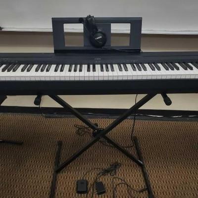 1064	
Yamaha Digital Piano with Stand and Head Set
Model P-45