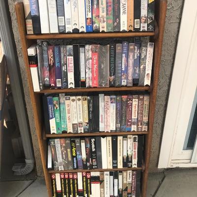 tons of vhs and dvds - many collectible