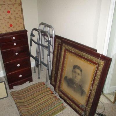 Victorian photo portraits, brown drawers, rug
