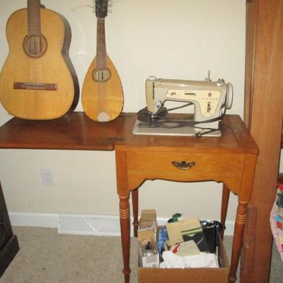 Singer machine, guitar & mandolin.