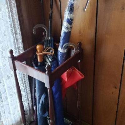 Vintage umbrellas and umbrella stand