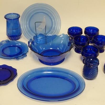 1247	13 PIECE COBALT BLUE GLASS, LOT INCLUDES SAILBOAT PLATE, XMAS TREE CANDLE HOLDERS, ETC
