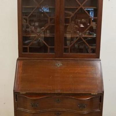 1244	MAHOGANY SLANT FRONT SECRETARY W/BOOKCASE TOP, HAS SERPENTINE FRONT & BALL & CLAW FEET, SOME WEAR TO THE FINISH
