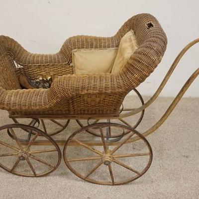 1243	WICKER BABY CARRIAGE, 38 IN LONG
