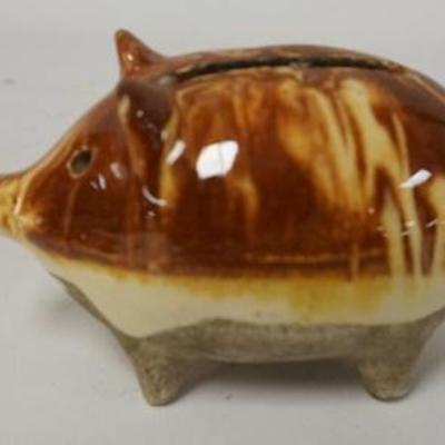 1093	SMALL POTTERY PIG BANK W/IMPRESSED MARK, 3 3/4 IN LONG
