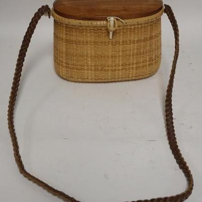 1049	FINELY MADE NANTUCKET PURSE, BRAIDED LEATHER STRAP, FINELY WOVEN BODY, 8 1/2 IN WIDE X 6 IN HIGH
