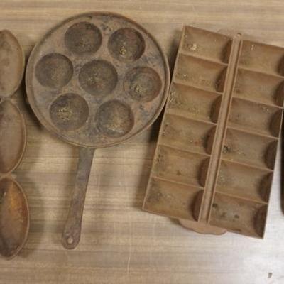 1246	LOT OF 4 DIFFERENT CAST IRON PANS
