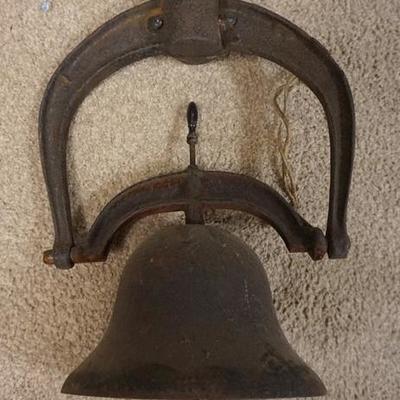 1011	ANTIQUE CAST IRON BELL, 15 1/2 IN HIGH, OPEN END OF BELL 9 1/8 IN DIAMETER, 12 1/2 IN AT WIDEST POINT OF FRAME
