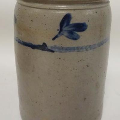 1062	2 GALLON BLUE DECORATED STONEWARE JAR, DECORATED ALL AROUND, HAIRLINES IN THE BASE, 12 1/4 IN HIGH, 8 IN TOP DIAMETER
