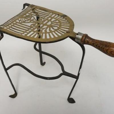 1090	ANTIQUE WROUGHT IRON & BRASS FIREPLACE TRIVET W/TURNED WOOD HANDLE, 12 IN HIGH
