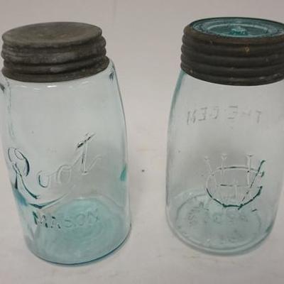 1116	2 CANNING JARS ROOT MASON & THE GEM, GEM HAS GLASS LID, TALLEST IS 7 1/8 IN
