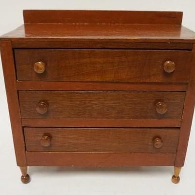 1103	MINIATURE 3 DRAWER CHEST ON TURNED FEET, 13 3/4 IN WIDE X 13 1/2 IN HIGH
