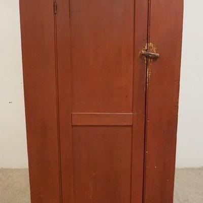1023	ANTIQUE 1 DOOR COUNTRY CUPBOARD IN RED, LOSSES TO REAR FEET, 71 IN HIGH X 17 1/4 IN DEEP X 39 1/2 IN WIDE
