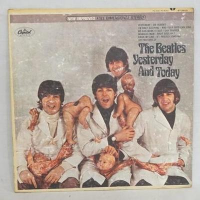 1043	THE BEATLES YESTERDAY & TODAY WITH ORIGINAL *BUTCHER* COVER CAPITOL RECORDS STEREO ST 2553. THERE IS SOME SCUFFS ON COVER INDICATING...