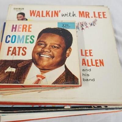 1086	LOT OF 22 NEW ORLEANS/RELATED ALBUMS & 45S/EPS THE ALBUMS ARE; FATS DOMINO- ROCK & ROLLIN' â€¦ A LOT OF DOMINOS, FATS ON FIRE, FATS...