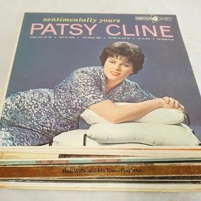 1057	LOT OF 25 COUNTRY ALBUMS; PATSU CLINE- SENTIMENTALLY YOUR'S, SHOWCASE (TWO COPIES). WANDA JACKSON LOVIN' COUNTRY STYLE, BOB NEWMAN...