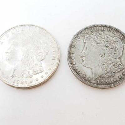 2552	

2 1921 Morgan Silver Dollars
Philadelphia Mint