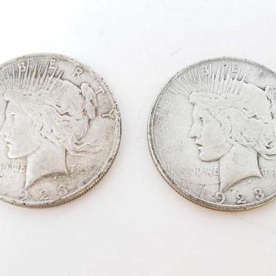 2596	

2 1923-D Silver Peace Dollars
Denver Mint
