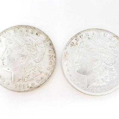 2562	

2 1921 Morgan Silver Dollars
Philadelphia Mint