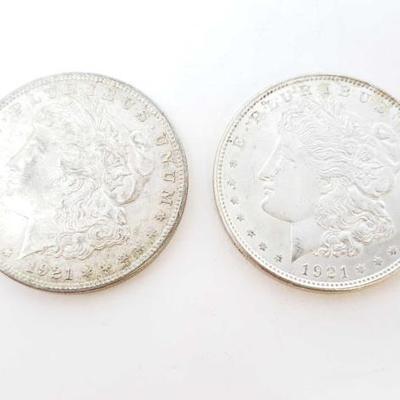 2570	

2 1921 Morgan Silver Dollars
Philadelphia Mint