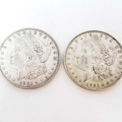 2550	

2 1921-D Morgan Silver Dollars
Denver Mint
