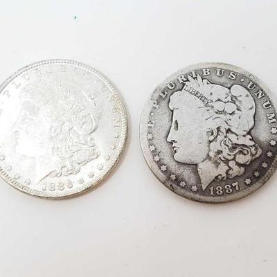 2542	

1886 And 1887-O Morgan Silver Dollars
Philadelphia And New Orleans Mint
