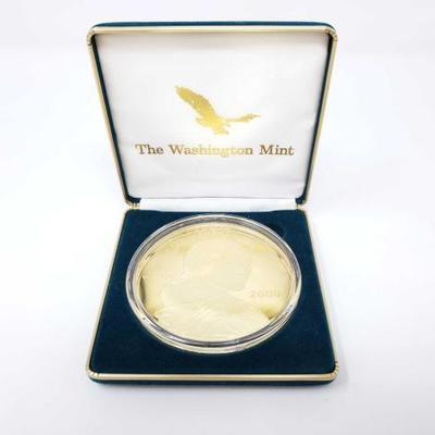 2512	

.999 Fine Silver Coin Layered In 24k Gold, 4oz
Weighs 4oz