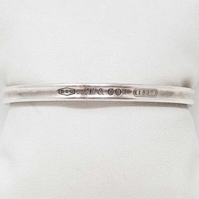 2242: Tiffany & Co. Sterling Silver 1837 Cuff, 18.5g
Weighs Approx 18.5g.
OS20-012564.3. 3/5.