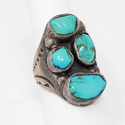 2014	

Sterling Silver Native American Turquoise Cluster Ring- 18.4g
Weighs Approx 18.4g
4 Genuine Turquoise Stones
Size 
Stamped FL JR...