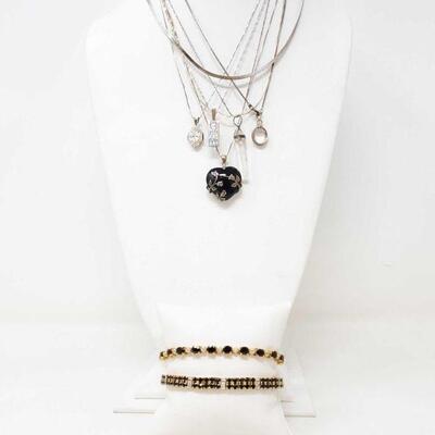 
#2314 â€¢ 7 Sterling Silver Necklaces, 5 Pendants, And 2 Bracelets