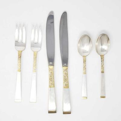 2750	

Sterling Silver Flatware
4 Spoons, 4 Knives, And 7 Forks