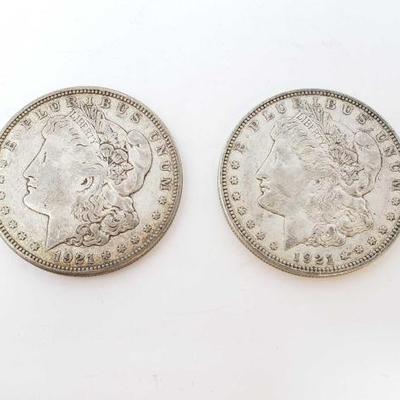 2556	

2 1921-D Morgan Silver Dollars
Denver Mint