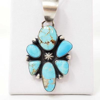 2080	

B Johnson Nevada Turquoise Cluster Sterling Silver Pendant Stones, 19.4g
Weighs Approx 19.4g
Genuine Nevada Turquoise 
Navajo...